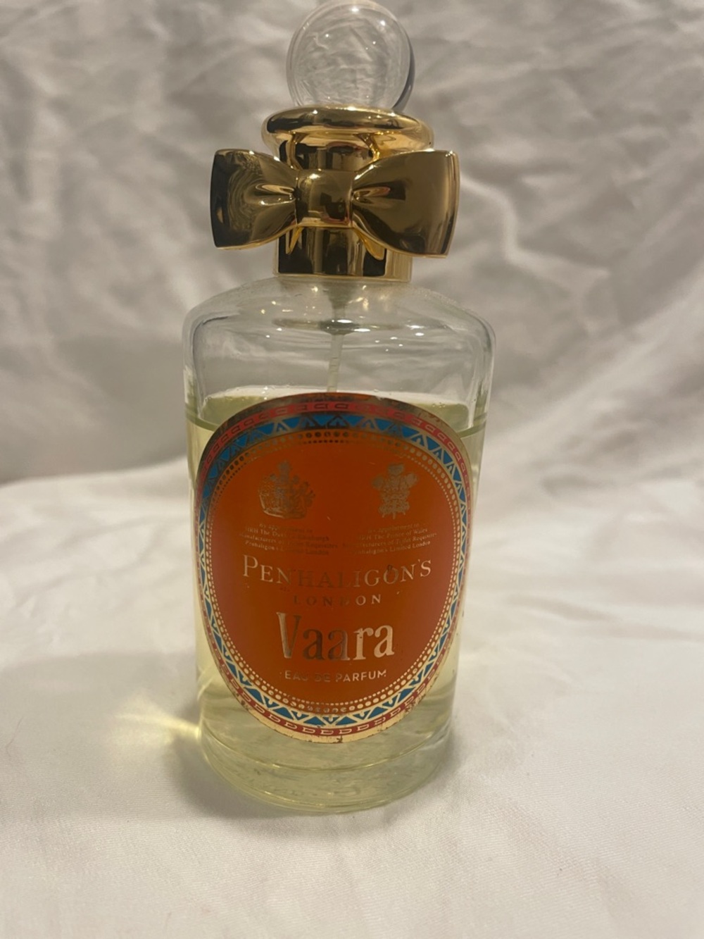 Penhaligon's Vaara Clear Bottle with Orange Label and Gold Bow Cap